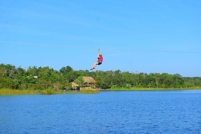 Adventure in a Private Mayan Community - Rappelling into a cenote