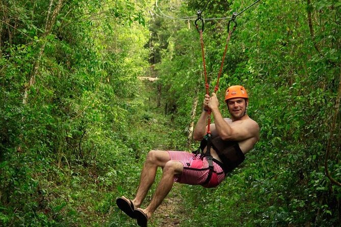ATV Cenote and Zipline Adventure from Tulum - Swimming through the semi-dry cenote
