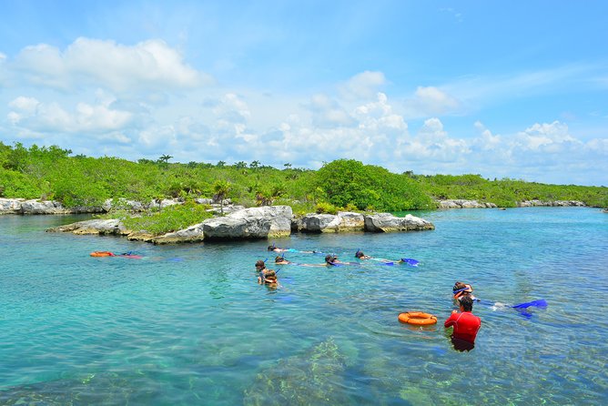 ATV Extreme and Snorkel Adventure from the Riviera Maya - Ziplining above the trees