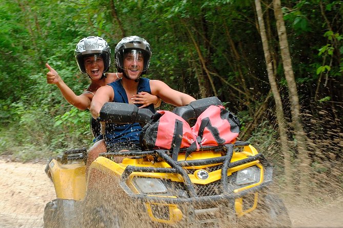 ATV Xtreme and Zipline Adventure from Riviera Maya - Riding a two-person ATV through the jungle