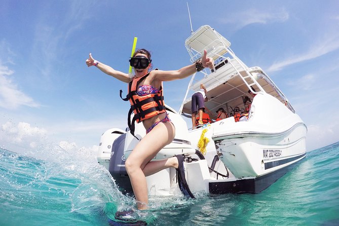 Beach Escape: Isla Contoy and Isla Mujeres with Snorkeling. - Isla Mujeres is colorful, crowded, and brief