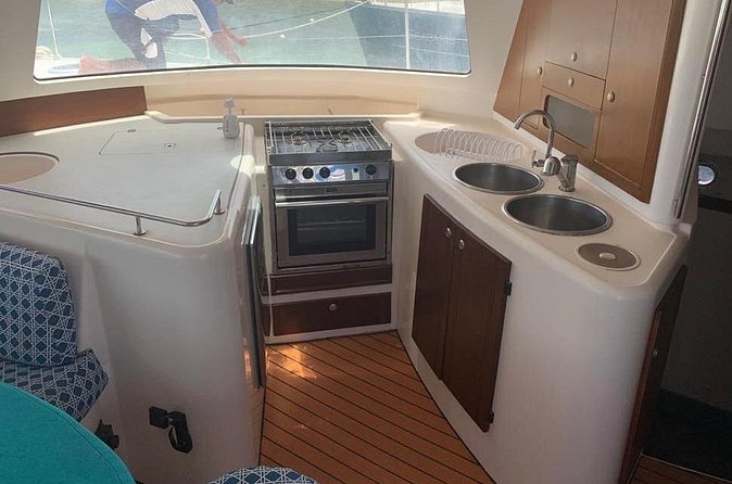 Catamaran Tour to Isla Mujeres Snorkeling with Buffet and Open Bar - Buffet and open bar: useful value, not a luxury guarantee