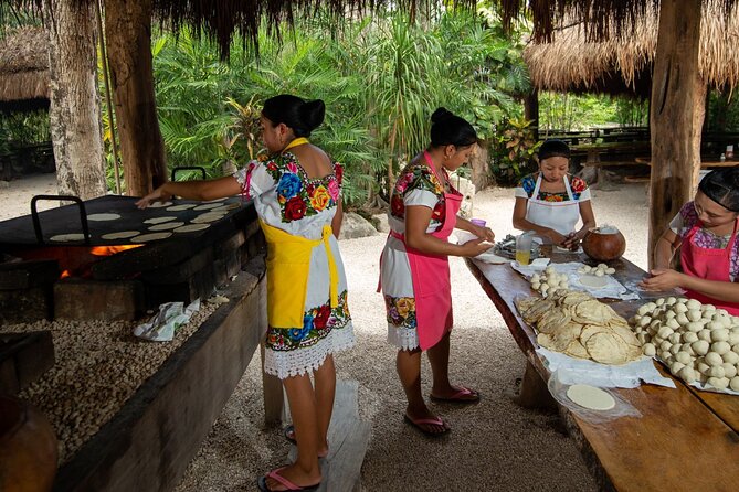 Cenote Tankah and Mayan Village Tour with Zipline, Canoes & Lunch - A Mayan village lunch brings local context