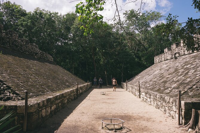 Cobá Ruins Mayan Village and Cenote Tour from Riviera Maya - Seeing Cobá’s pyramid in its jungle setting