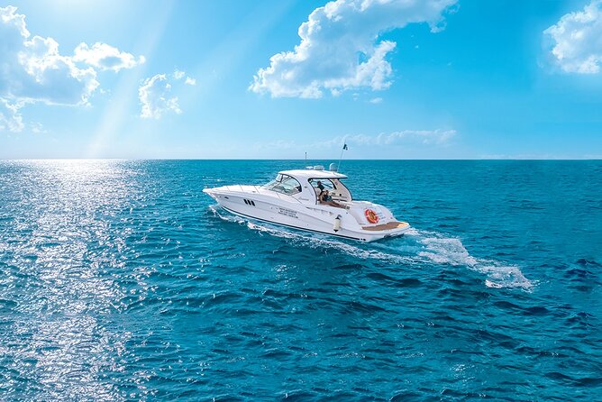 Cozumel Private Yacht and Snorkel with Lunch and Open Bar Onboard - A private boat day with Cozumel as the backdrop