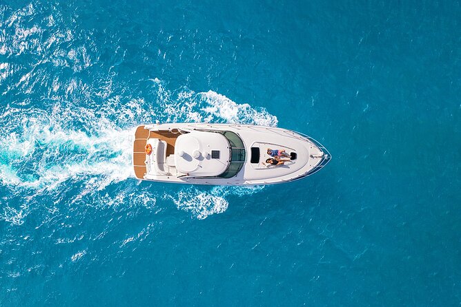 Cozumel Private Yacht and Snorkel with Lunch and Open Bar Onboard - Boarding a yacht reserved for your party