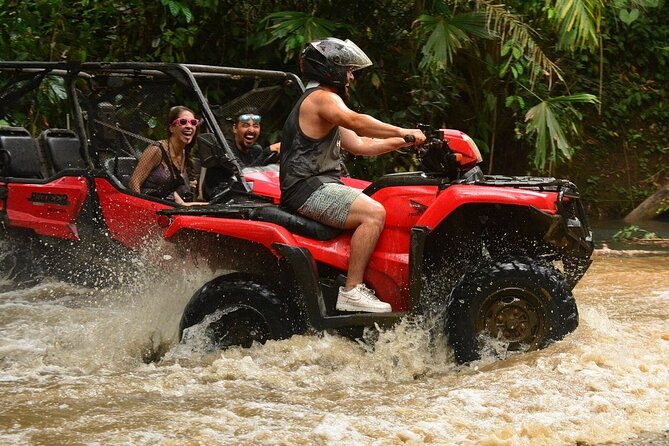 Experience in Atvs in the Mayan Jungle with Cenote and Zip Line - Riding a quad through the Mayan jungle