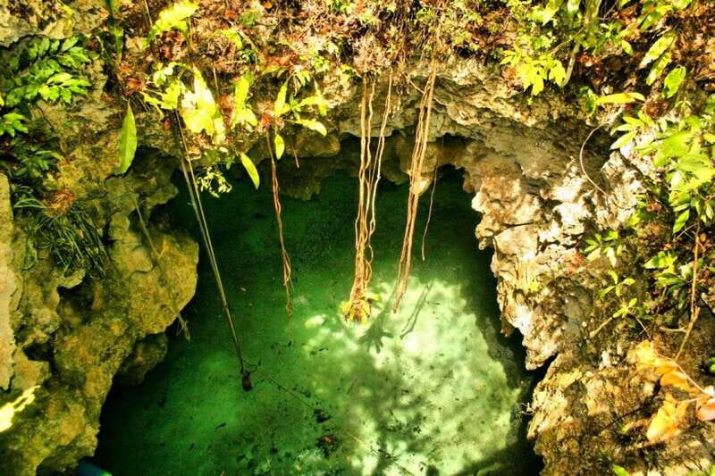 From Riviera Maya: Snorkeling & Private Cenote Half-Day Tour - Entering the limestone cave