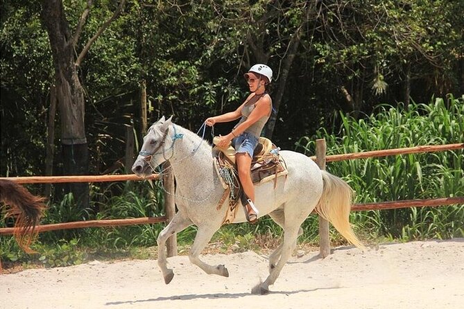 Full Day Adventure: Horses , ATV, Ziplines & Cenote w/Lunch - ATV riding through the jungle