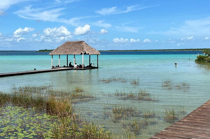 Full Day Bacalar with Boat Tour, Cenote Azul and Breakfast - Cruising the Lake of the Seven Colors