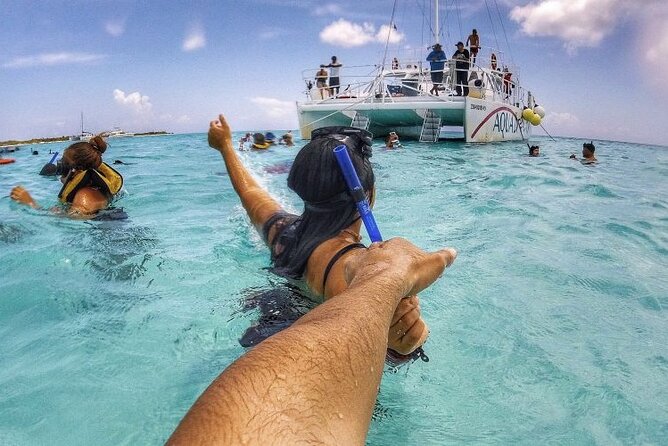 Full-Day Catamaran Cozumel Tour with Sky Snorkeling - Boarding the catamaran for Palancar