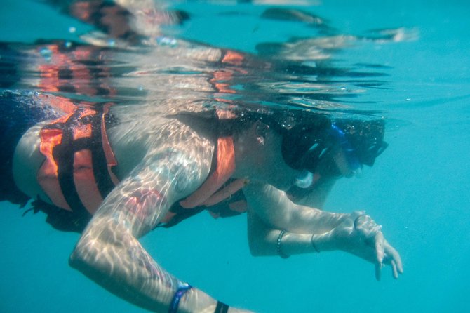 Full-Day Sailing Trip to Mujeres Island from Playa del Carmen - Timing, weather, and cancellation