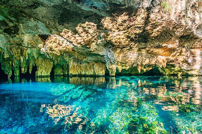 Half day Tulum Archeological site & Underground river with Lunch - Entering Tulum with El Castillo in view