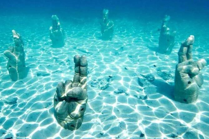 Isla Mujeres on luxury catamaran with snorkel, open bar and lunch - Pickup from Playa del Carmen and Riviera Maya