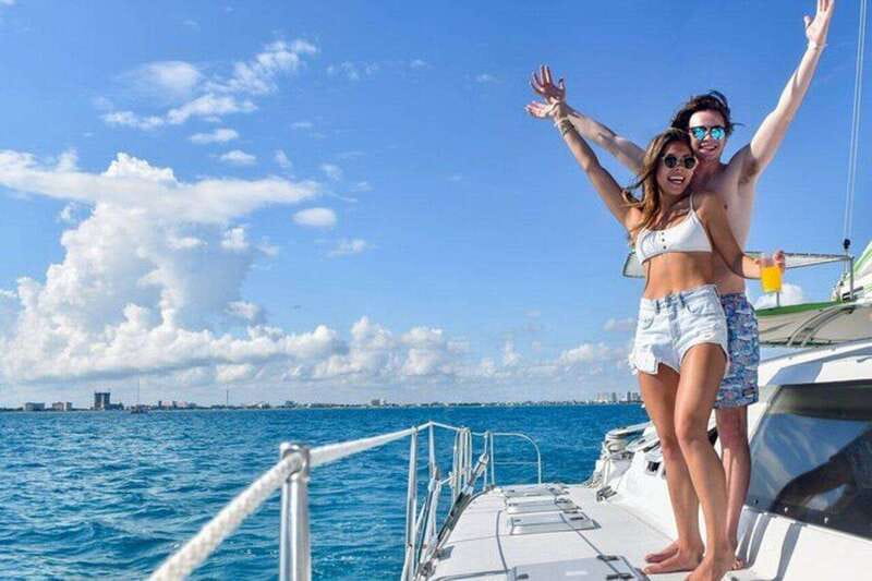 Isla Mujeres Plus Experience Catamaran Tour + Snorkel+Lunch - A Seven-Hour Day on the Caribbean