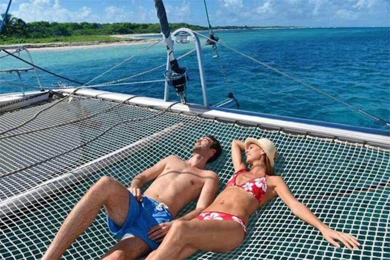 Isla Mujeres Plus Experience Catamaran Tour + Snorkel+Lunch - Cruising by Catamaran From Cancún