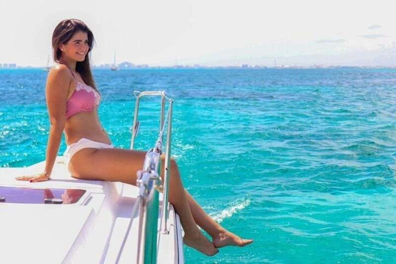 Isla Mujeres Plus Experience Catamaran Tour + Snorkel+Lunch - The Return Ride and Possible Spinnaker Sailing