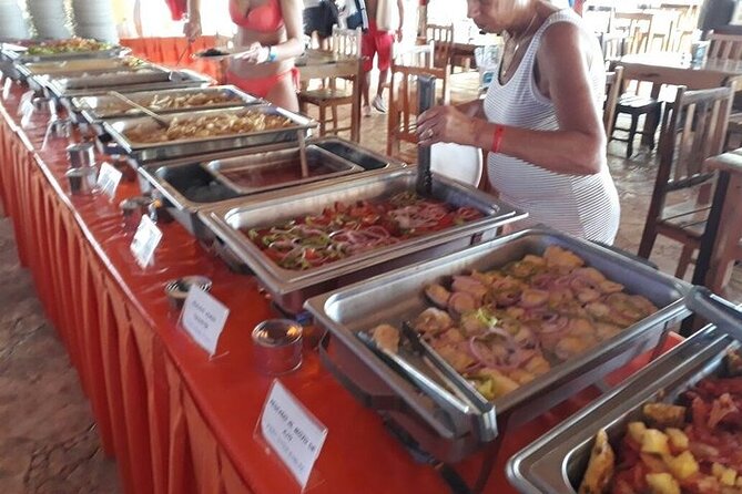 Isla Mujeres Unlimited Catamaran! Drinks, Fun & Party From Playa Del Carmen - Buffet lunch and the beach-club stop