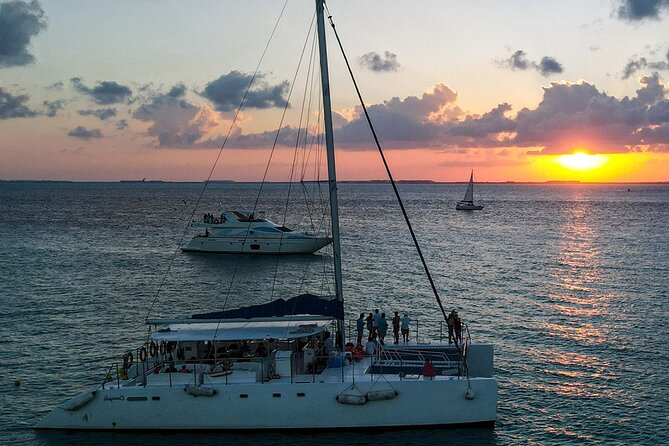 Isla Mujeres Unlimited Catamaran! Drinks, Fun & Party From Playa Del Carmen - Language, weather, and practical limits