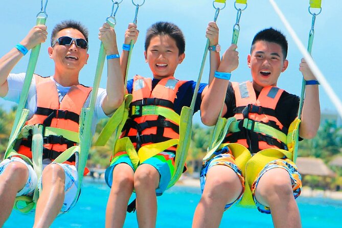 Parasailing & Beach Club with Transportation In Riviera Maya - The $105 Price and the Extra Cash You Need