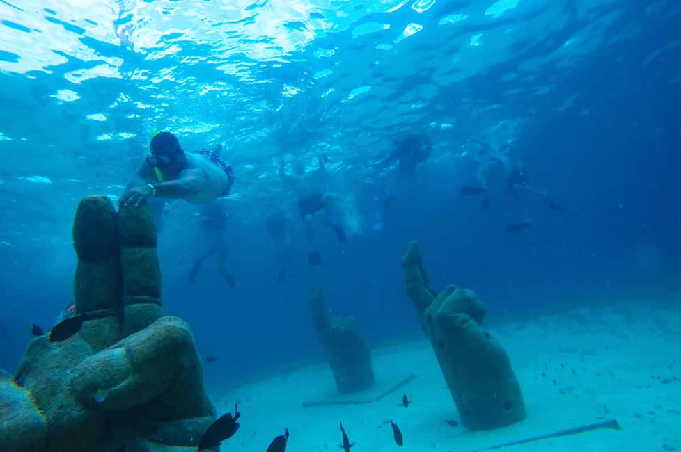 PDC: Isla Mujeres Catamaran Tour with Snorkeling - Ninety minutes in downtown Isla Mujeres