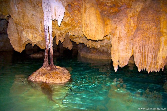 Silent Meditation in the Heart of the Cenote - Private groups - Entering the private cenote near Tulum