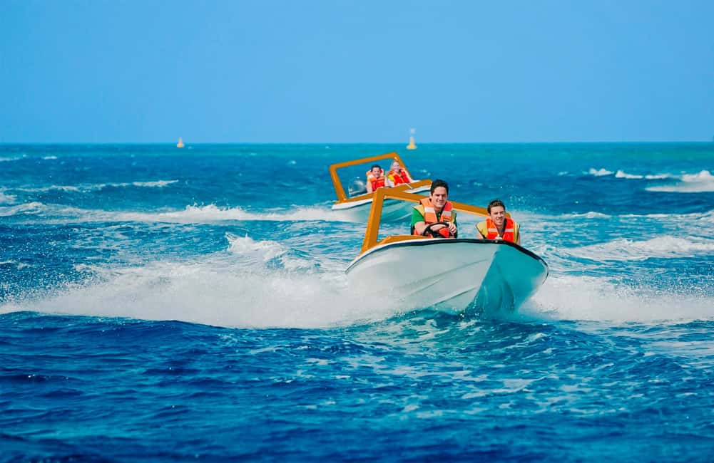 Speed Boat, Snorkel and Beach - Taking the wheel off Cozumel