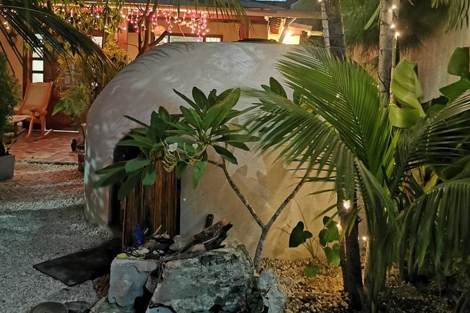 Traditional and ancestral Temazcal experience - Cooling down with a rustic garden shower