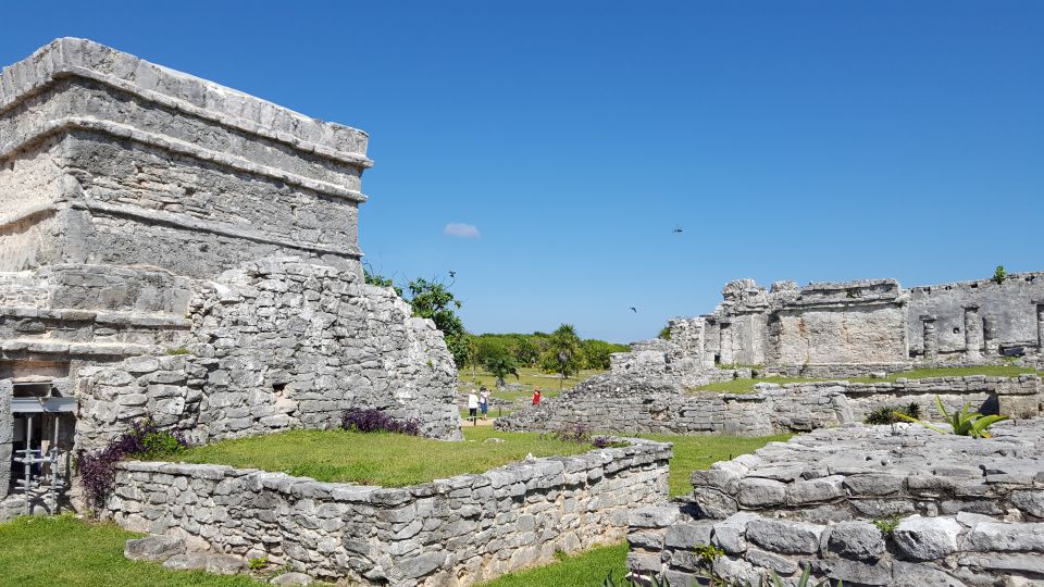 Tulum: Guided Bike Tour of Tulum Ruins, Tacos & Cenote - Riding through Tulum pueblo