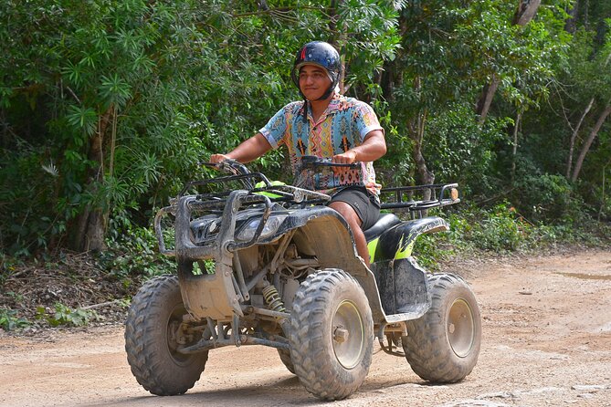 Tulum's Thrilling Jungle: ATV, Zip Lines, Cenote & More! - Swimming in a natural cenote