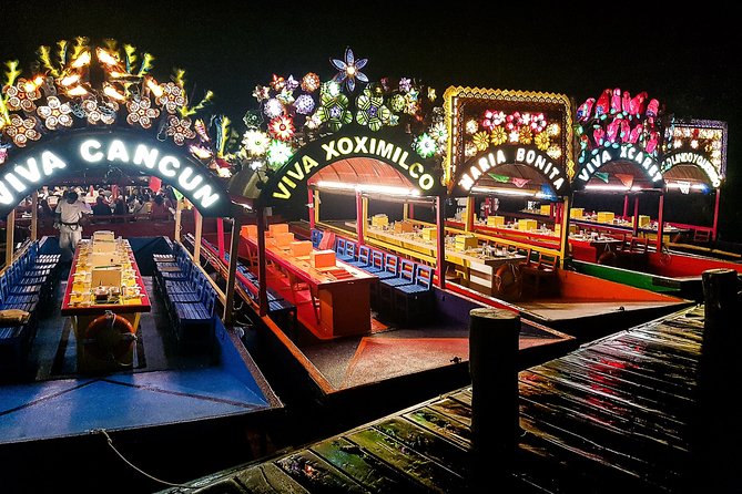 Xoximilco Night Cruise With Round Transportation from Tulum City - Games, contests, and the shared-table format